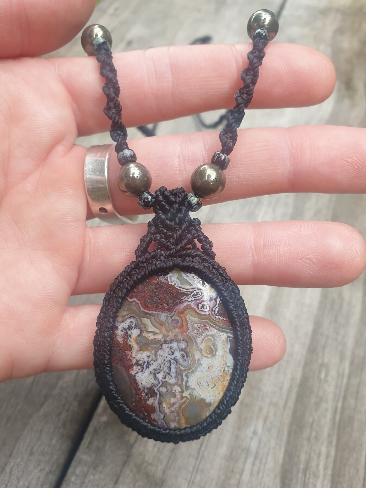 Crazy Lace Agate and Pyrite macrame pendant